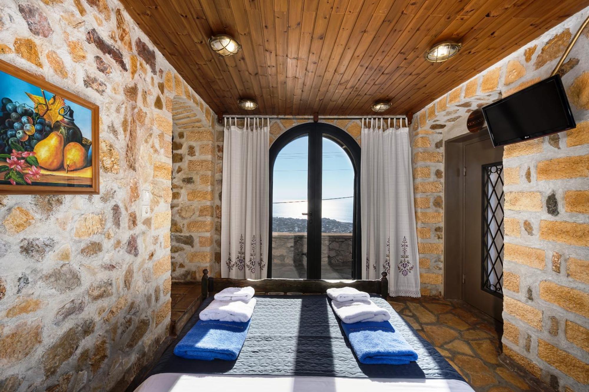 Four Seasons Stonework Castle Villa Lagonisi Buitenkant foto